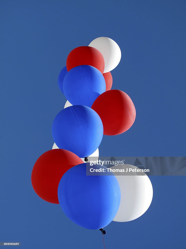 Red, white and blue helium balloons