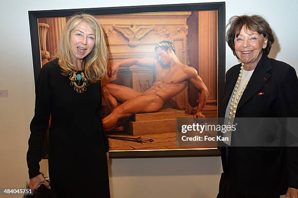 Sophie Deniau and Lise Toubon attend the 'Heros' Pierre et Gilles Exhibition At Galerie Templon on April 10, 2014 in Paris, France.