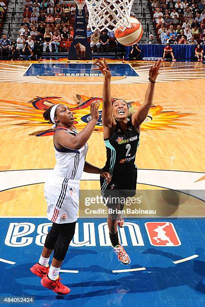 Candice Wiggins of the New York Liberty shoots the ball against the Connecticut Sun at the Mohegan Sun Arena on August 14, 2015 in Uncasville,...