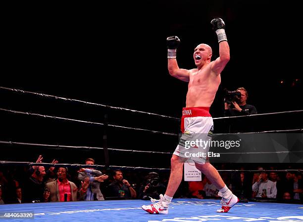 Krzysztof Glowacki of Poland celebrates after defeated Marco Huck of Germany during the Premier Boxing Champions Cruiserweight bout at the Prudential...