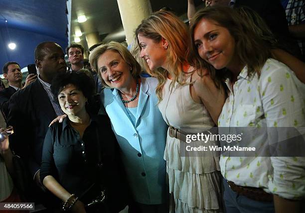 Democratic presidential candidate Hillary Clinton greets supporters in the audience after speaking at the Iowa Democratic Wing Ding August 14, 2015...