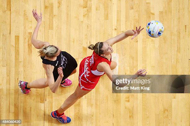 Joanne Harten of England is challenged by Katrina Grant of New Zealand during the 2015 Netball World Cup Semi Final 1 match between New Zealand and...