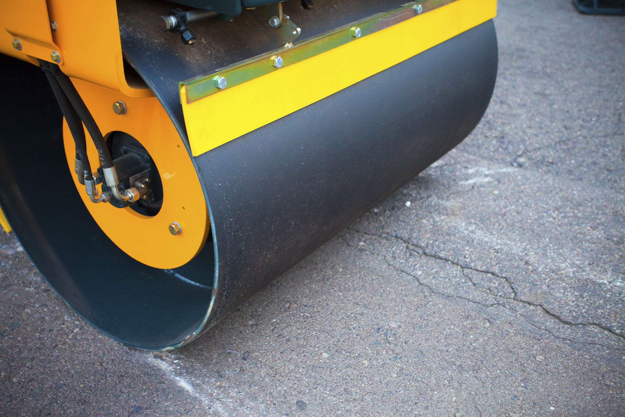 Road rollers close-up during asphalt paving works Road rollers close-up during asphalt paving works