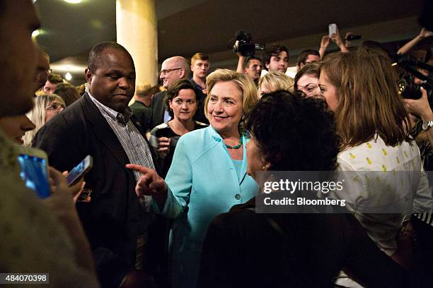 Hillary Clinton, former U.S. Secretary of state and democratic candidate for U.S. President, center, greets attendees during the Democratic Wing Ding...