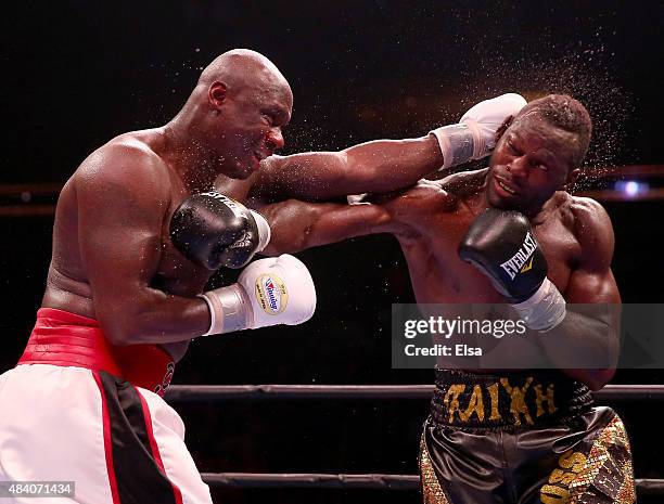 Antonio Tarver and Steve Cunningham exchange punches during the Premier Boxing Champions Heavyweight bout at the Prudential Center on August 14, 2015...