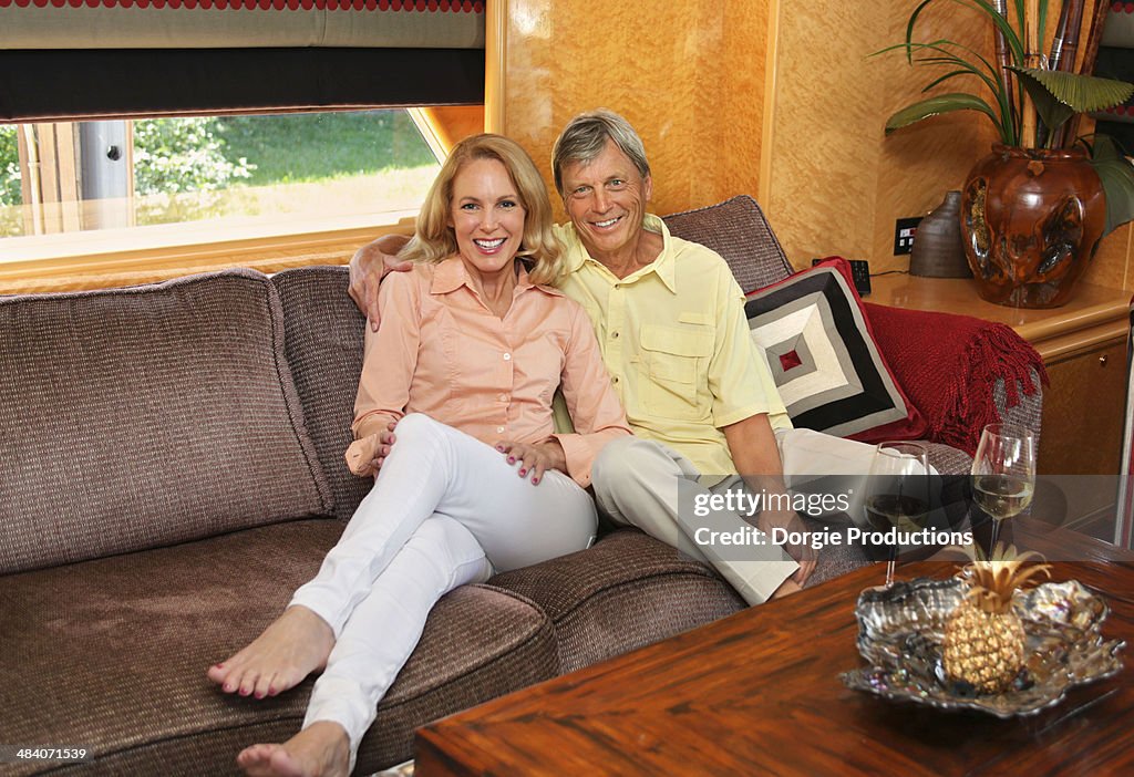 Couple relaxing in a luxury yacht living room