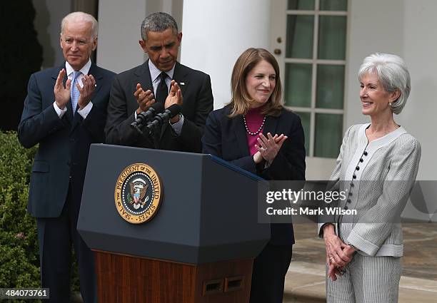 President Barack Obama , U.S. Vice President Joe Biden and Director of the White House Office of Management and Budget Sylvia Mathews Burwell applaud...