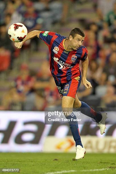 Michael Bridges of the Jets attempts to head the ball during the round 27 A-League match between the Newcastle Jets and Adelaide United at Hunter...