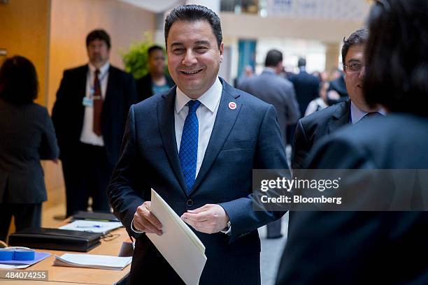 Ali Babacan, Turkey's deputy prime minister, walks in to a Group-of-20 ministerial meeting on the sidelines of the IMF and World Bank Group Spring...