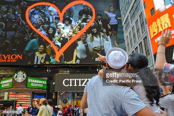 As a singular example of how both Times Square and human behavior have changed since Eisenstaedt's photograph, a couple from the V-J Day kiss-in...