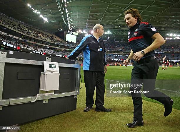 James Hird, coach of the Essendon Bombers walks to the coaches box during the round 20 AFL match between the Essendon Bombers and the Adelaide Crows...