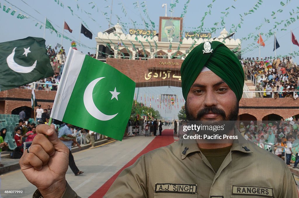 A ranger waving his national flag during the parade.