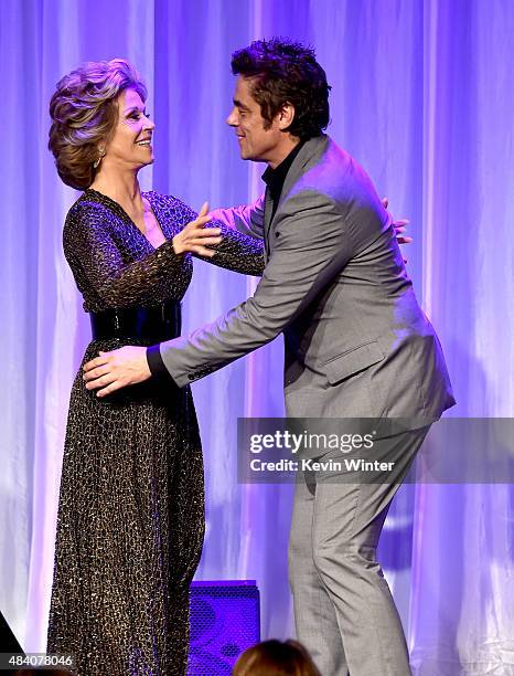 Actors Jane Fonda and Benicio del Toro appear onstage during HFPA Annual Grants Banquet at the Beverly Wilshire Four Seasons Hotel on August 13, 2015...