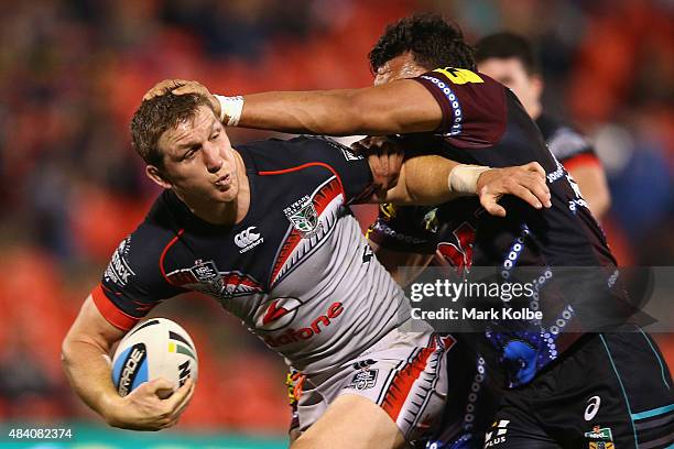 Ryan Hoffman of the warriors is tackled during the round 23 NRL match between the Penrith Panthers and the New Zealand Warriors at Pepper Stadium on...