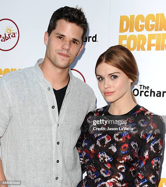 Actor Max Carver and actress Holland Roden attend the premiere of "Digging For Fire" at ArcLight Cinemas on August 13, 2015 in Hollywood, California.