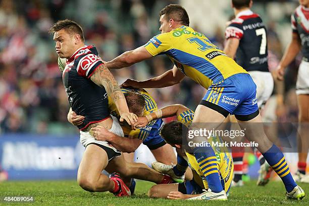 Jared Waerea-Hargreaves of the Roosters is tackled during the round 23 NRL match between the Sydney Roosters and the Parramatta Eels at Allianz...