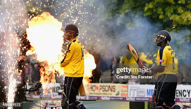 Hampshire batsmen Michael Carberry and James Vince make their way to the middle before the NatWest T20 Blast quarter final match between...