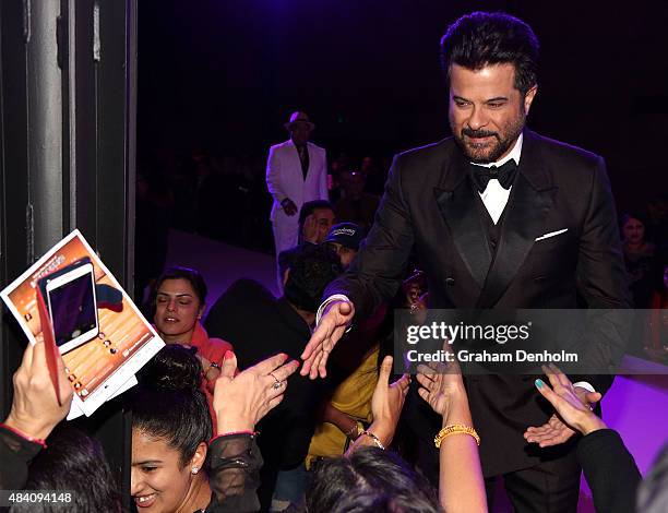 Anil Kapoor greets fans during the Indian Film Festival of Melbourne Awards Night at National Gallery of Victoria on August 15, 2015 in Melbourne,...