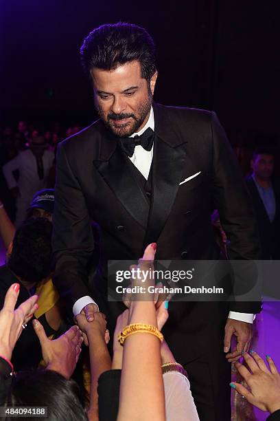 Anil Kapoor greets fans during the Indian Film Festival of Melbourne Awards Night at National Gallery of Victoria on August 15, 2015 in Melbourne,...