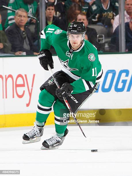 Dustin Jeffrey of the Dallas Stars handles the puck against the Nashville Predators at the American Airlines Center on April 8, 2014 in Dallas, Texas.