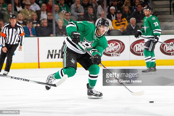 Dustin Jeffrey of the Dallas Stars handles the puck against the Nashville Predators at the American Airlines Center on April 8, 2014 in Dallas, Texas.