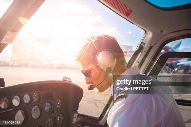 helicopter pilot - helicopter pilot stock pictures, royalty-free photos & images