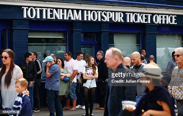 Tottenham supporters are seen at the ticket office prior to the Barclays Premier League match between Tottenham Hotspur and Stoke City at White Hart...
