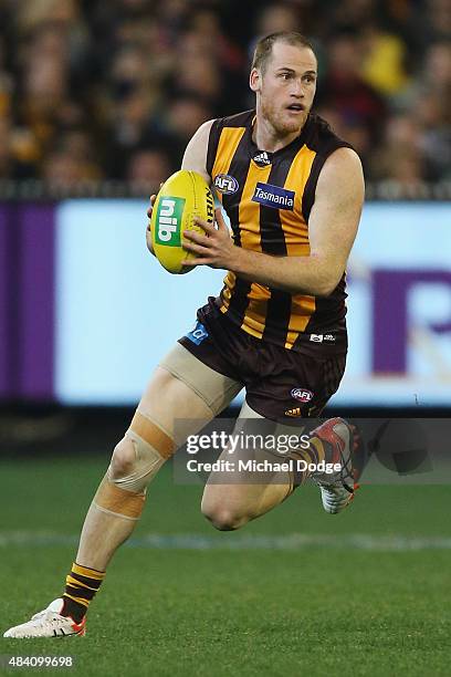 Jarryd Roughead of the Hawks runs with the ball during the round 20 AFL match between the Geelong Cats and the Hawthorn Hawks at Melbourne Cricket...