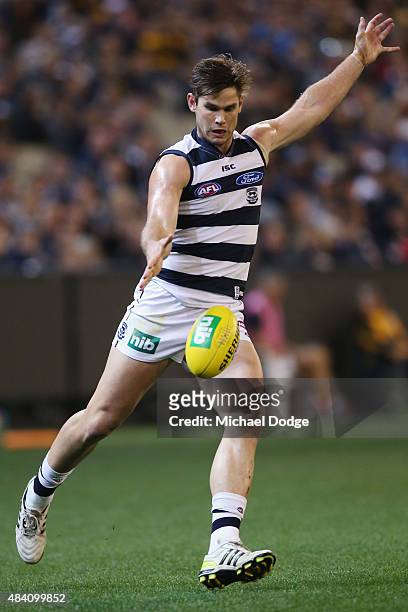 Mathew Stokes of the Cats kicks the ball during the round 20 AFL match between the Geelong Cats and the Hawthorn Hawks at Melbourne Cricket Ground on...