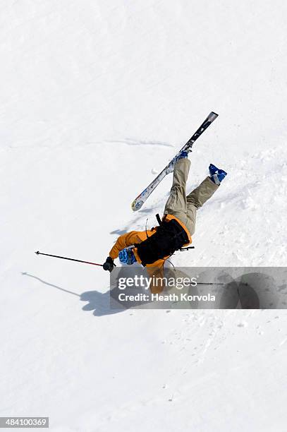 man crashing head first on skis. - sports head injuries imagens e fotografias de stock