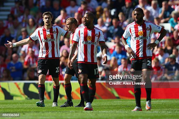 Sunderland players react after conceding the first goal to Norwich during the Barclays Premier League match between Sunderland and Norwich City at...