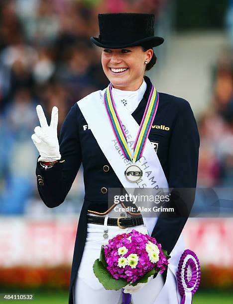 Kristina Broering-Sprehe of Germany celebrates finishing second in the Dressage Grand Prix Special Individual Final on Day 4 of the FEI European...