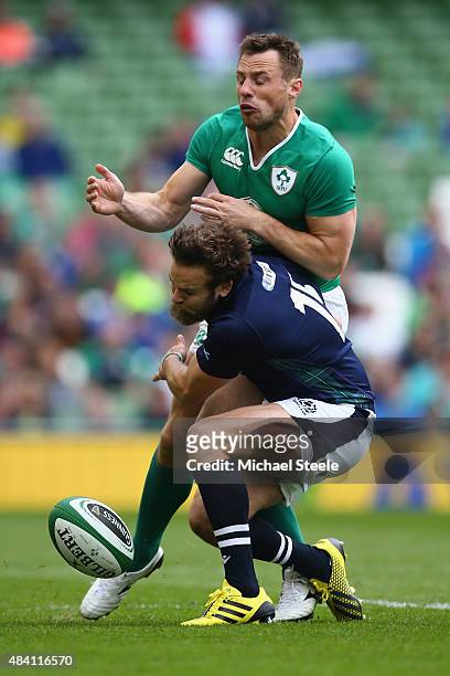 Tommy Bowe of Ireland is tackled by Ruaridh Jackson of Scotland during the International match between Ireland and Scotland at the Aviva Stadium on...