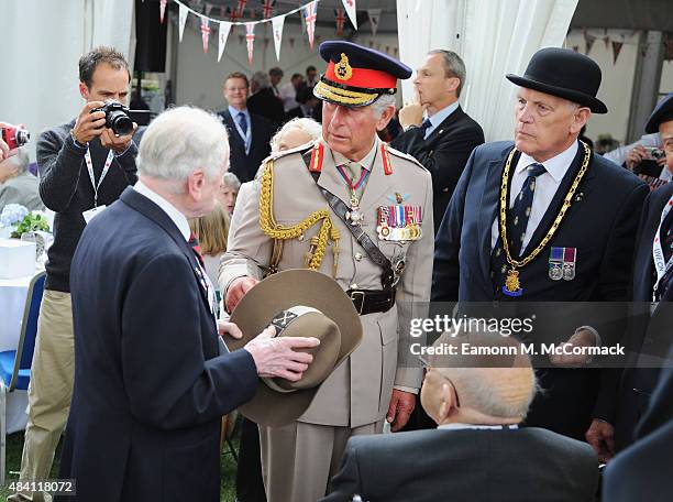 Prince Charles, Prince of Wales meets veterans during the 70th Anniversary commemorations of VJ Day at the Royal British Legion reception in the...