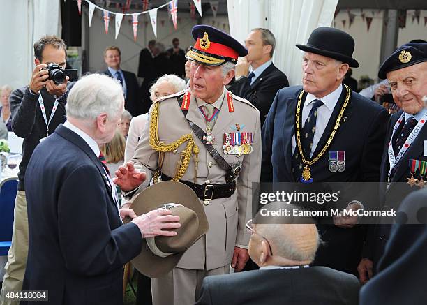 Prince Charles, Prince of Wales meets veterans during the 70th Anniversary commemorations of VJ Day at the Royal British Legion reception in the...