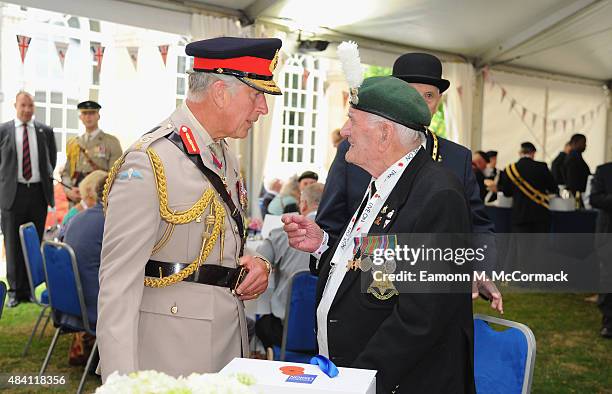 Prince Charles, Prince of Wales meets veterans during the 70th Anniversary commemorations of VJ Day at the Royal British Legion reception in the...