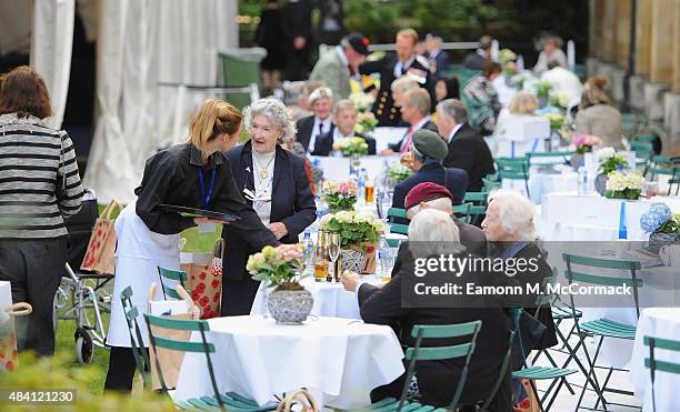 British Armed Forces Veterans during the 70th Anniversary commemorations of VJ Day at the Royal British Legion reception in the College Gardens,...