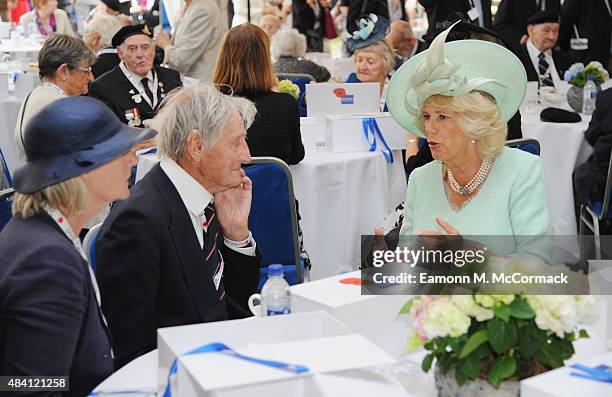 Camilla, Duchess of Cornwall meets veterans during the 70th Anniversary commemorations of VJ Day at the Royal British Legion reception in the College...