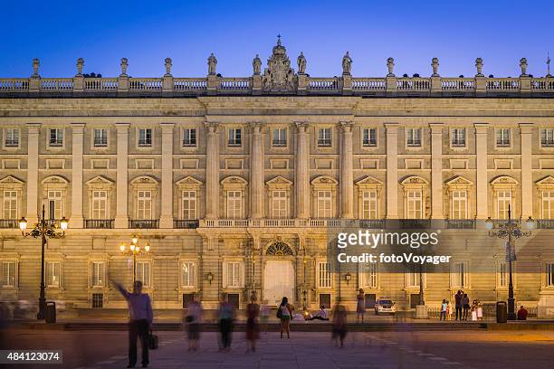 madrid people in plaza de oriente outside royal palace spain - koninklijk paleis van madrid stockfoto's en -beelden