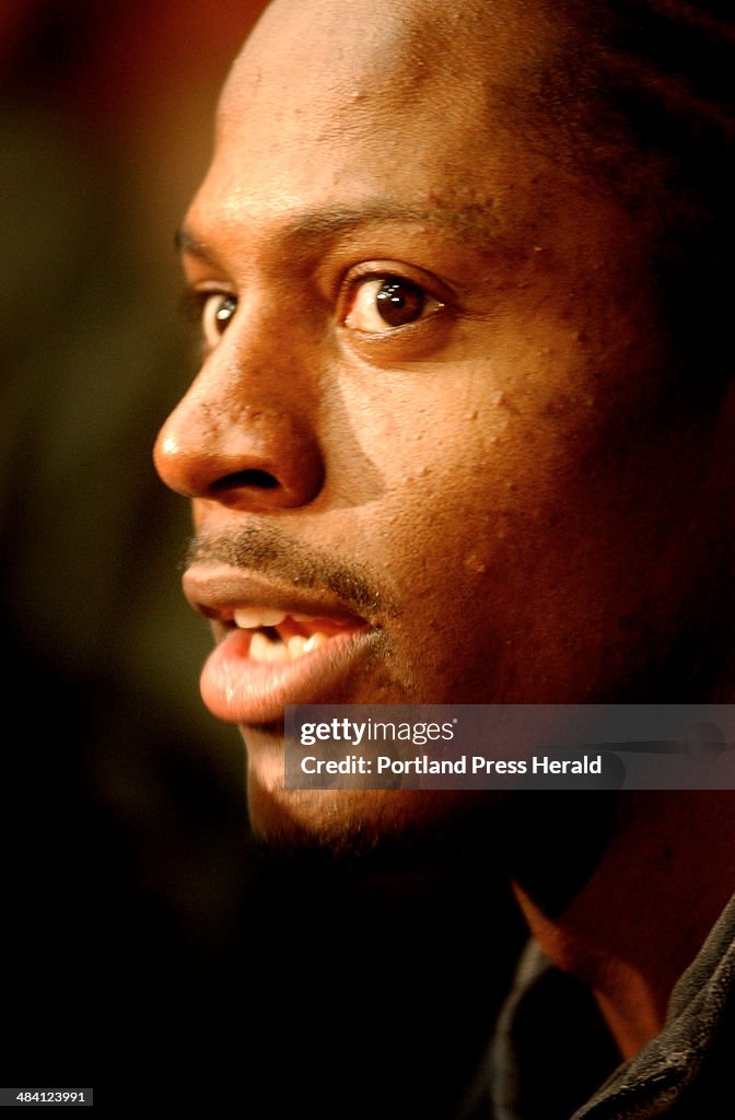 New England Patriots receiver Troy Brown talks with members of the media at the George R. Brown Conv...