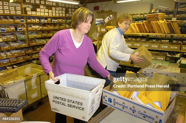 Staff Photo by John Ewing, Sunday, January 22, 2006: Sue Barton handles the mailing out of seed orders at Pinetree Garden Seeds in New Gloucester....