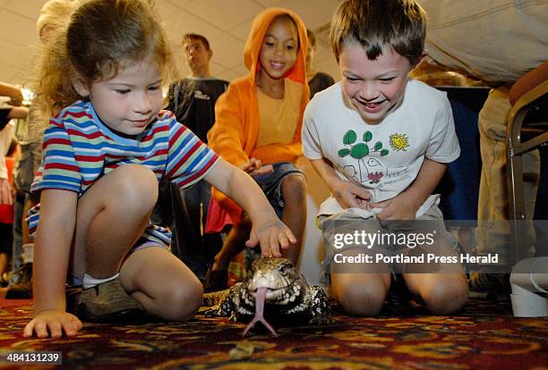 Staff Photo By Shawn Patrick Ouellette, Sunday, August 27, 2006 : L to R, Molly Dowe of New Gloucester, Ella Altidor 6, of Portland and Ben Dowe 6,...