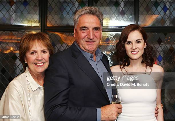 Penelope Wilton, Jim Carter and Michelle Dockery attend the Downton Abbey wrap party at The Ivy on August 15, 2015 in London, England.