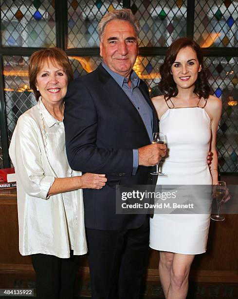 Penelope Wilton, Jim Carter and Michelle Dockery attend the Downton Abbey wrap party at The Ivy on August 15, 2015 in London, England.