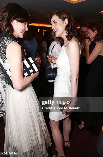 Elizabeth McGovern and Michelle Dockery attend the Downton Abbey wrap party at The Ivy on August 15, 2015 in London, England.