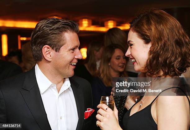 Allen Leech and Lily James attend the Downton Abbey wrap party at The Ivy on August 15, 2015 in London, England.
