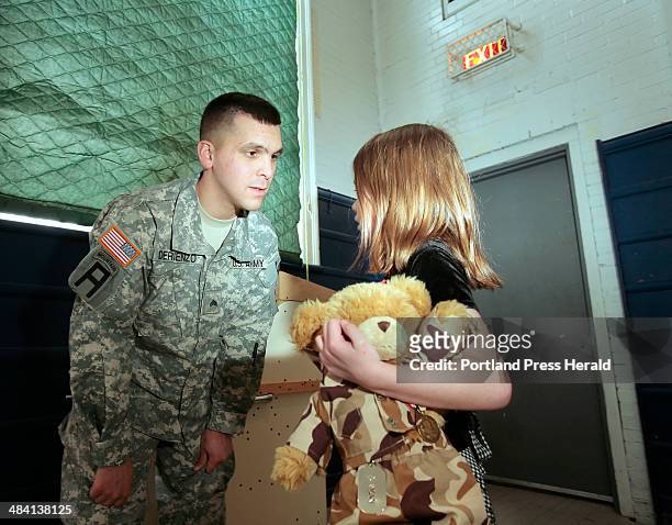 Staff photo by Gregory Rec -- Sgt. David DeRienzo talks with his niece Samantha Gummoe, whose first grade class at Greater Portland Christian School...