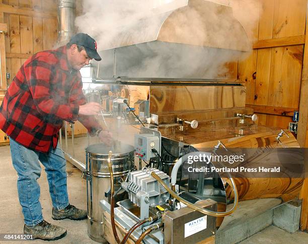 Staff Photo by Gordon Chibroski. March 16, 2007. William Symonds of Casco makes Sweet William Maple Syrup and is show here in his sugar house with...