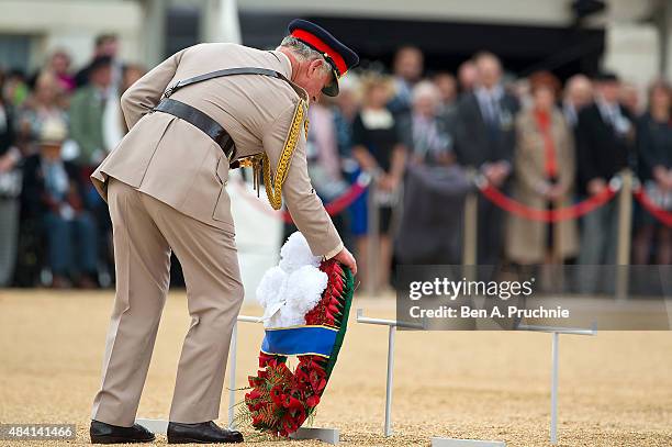 Charles, Prince of Wales lays a wreath during the Drumhead Service during the 70th Anniversary commemorations of VJ Day on Horse Guards Parade August...