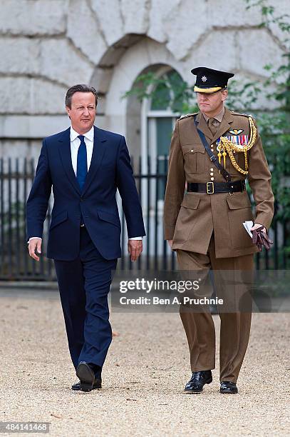 British Prime Minister David Cameron attends the Drumhead Service during the 70th Anniversary commemorations of VJ Day on Horse Guards Parade August...